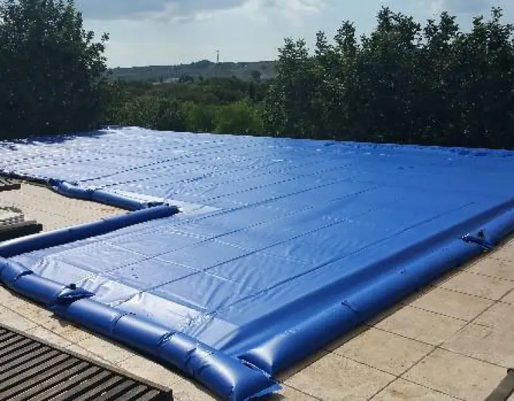 Telo copertura piscina combinato in pvc 650 gr e con predisposizione sacche d'acqua e occhielli